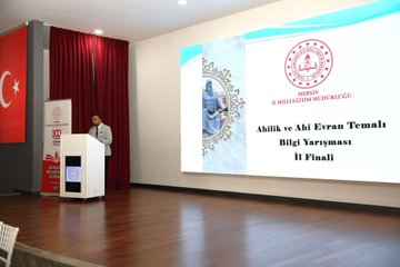 First image shows a man in a suit at a podium with a screen displaying Ahilik Bilgi Yarışması II Finali and Turkish flag backdrop. Second image depicts a formal panel discussion with participants seated around white-clothed tables in a spacious hall with chandeliers and wooden floors. Third image captures a quiz event with students in white uniforms seated at tables writing answers, a moderator in professional attire, and a screen showing Soru 7. Fourth image features a large group photo of adults and youth in various outfits including red shirts posing together in a hall with stage and flags.