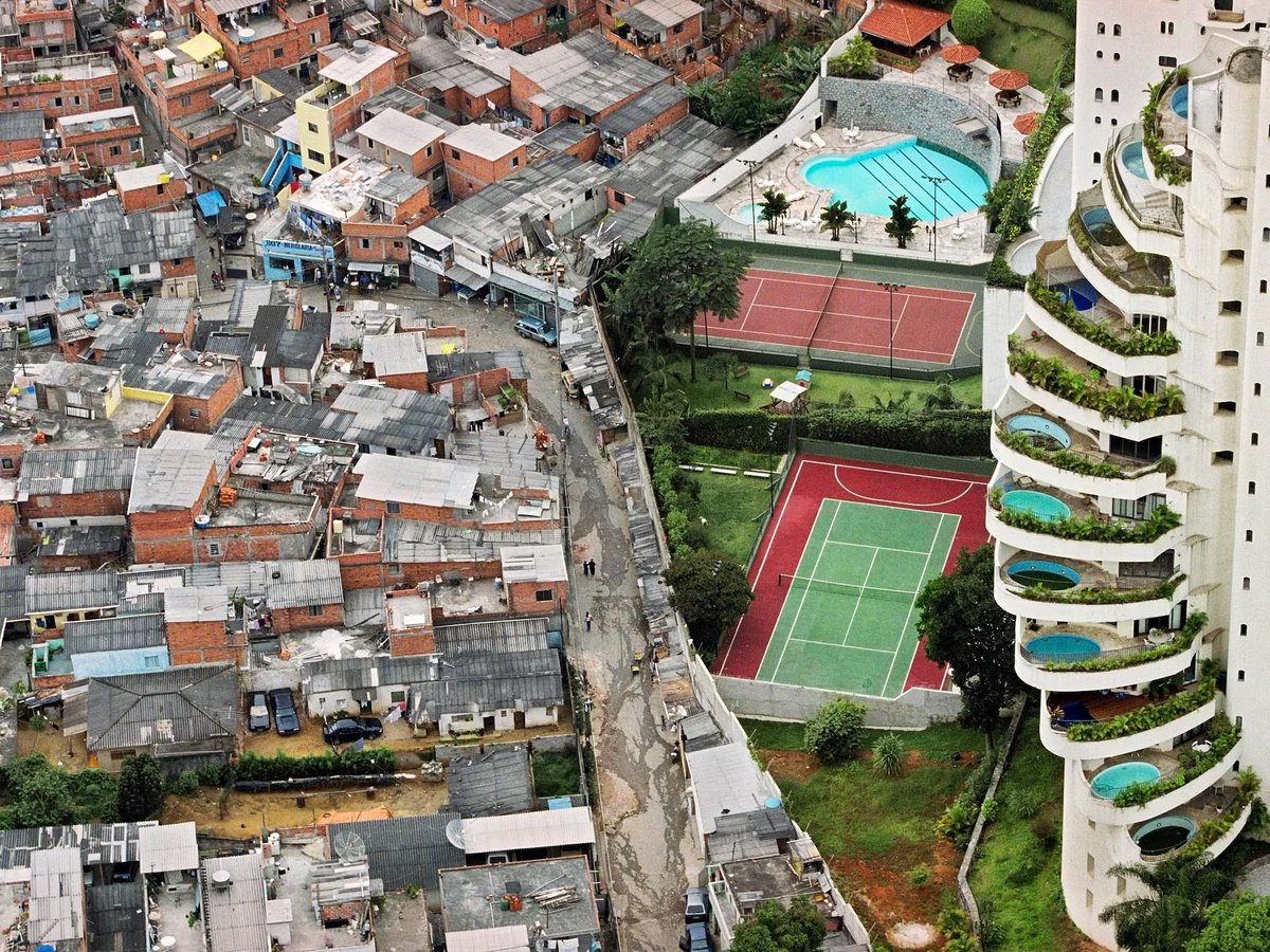 A neighborhood in Brazil where class distinction is very clearly seen.

Some blame capitalism, while others blame socialism. 

Which do you think is the guilty one?