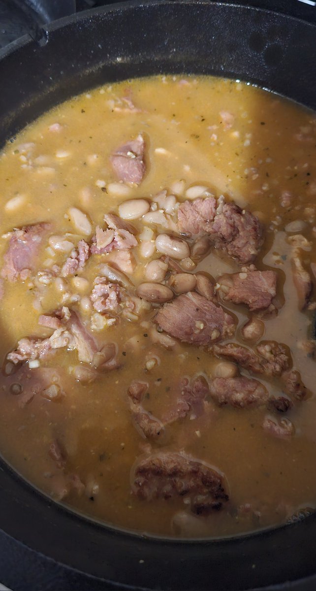 Dinner is slow cooking in the Dutch oven..... cant go wrong with a good batch of beans and corn bread