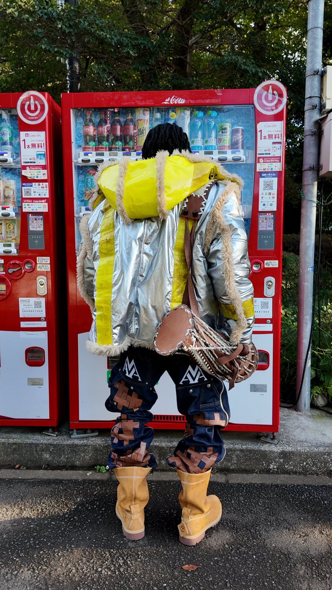 GUACAWOLE's tweet photo. Meanwhile I’m in Tokyo with that shit on. Reversible Shearling, First Aid Repaired Denim &amp; Talking Drum Bag. https://t.co/WhzG3R1kxD