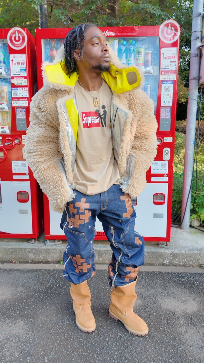 GUACAWOLE's tweet photo. Meanwhile I’m in Tokyo with that shit on. Reversible Shearling, First Aid Repaired Denim &amp; Talking Drum Bag. https://t.co/WhzG3R1kxD