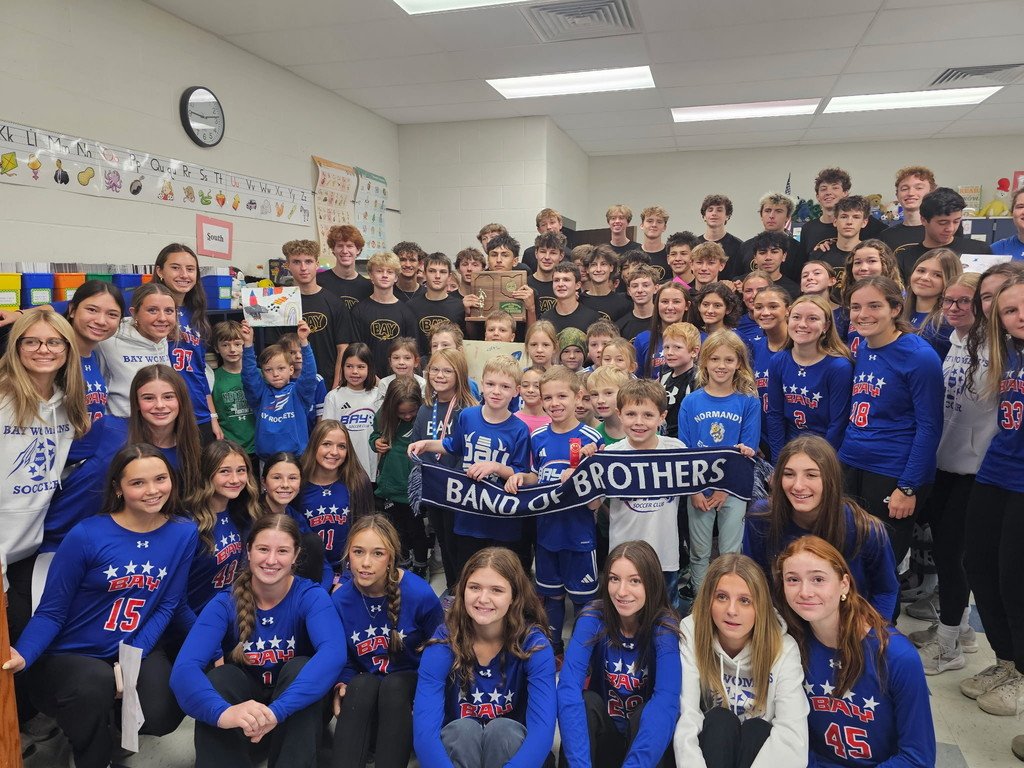 How lucky is Mrs. Hart's second-grade class?! They had  both girls and boys soccer teams come and visit them today before they head to States . The class has been making cards, posters and treat bags all postseason. Go Rockets!
