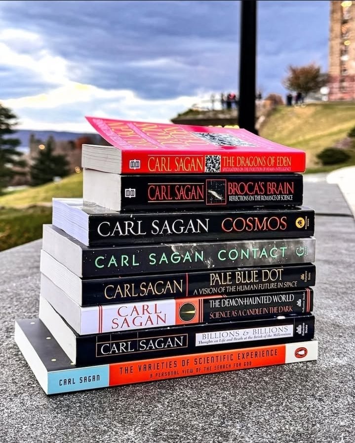 Saganismm's tweet image. This is literally the best book list that rewires your brain for cosmic perspective