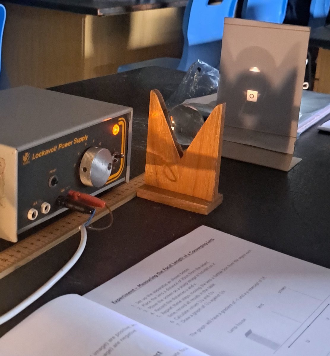 SPCScienceDept's tweet image. Year 13 Physicists are focusing on lenses. By altering the distance between the object and lens they obtained sharp images on a screen. Students were able to see real, inverted images of different magnications. Measure values of u and v to find the focal length of lens.