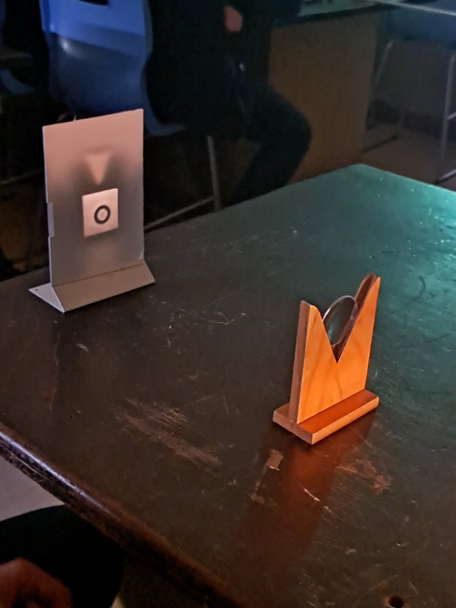 SPCScienceDept's tweet image. Year 13 Physicists are focusing on lenses. By altering the distance between the object and lens they obtained sharp images on a screen. Students were able to see real, inverted images of different magnications. Measure values of u and v to find the focal length of lens.