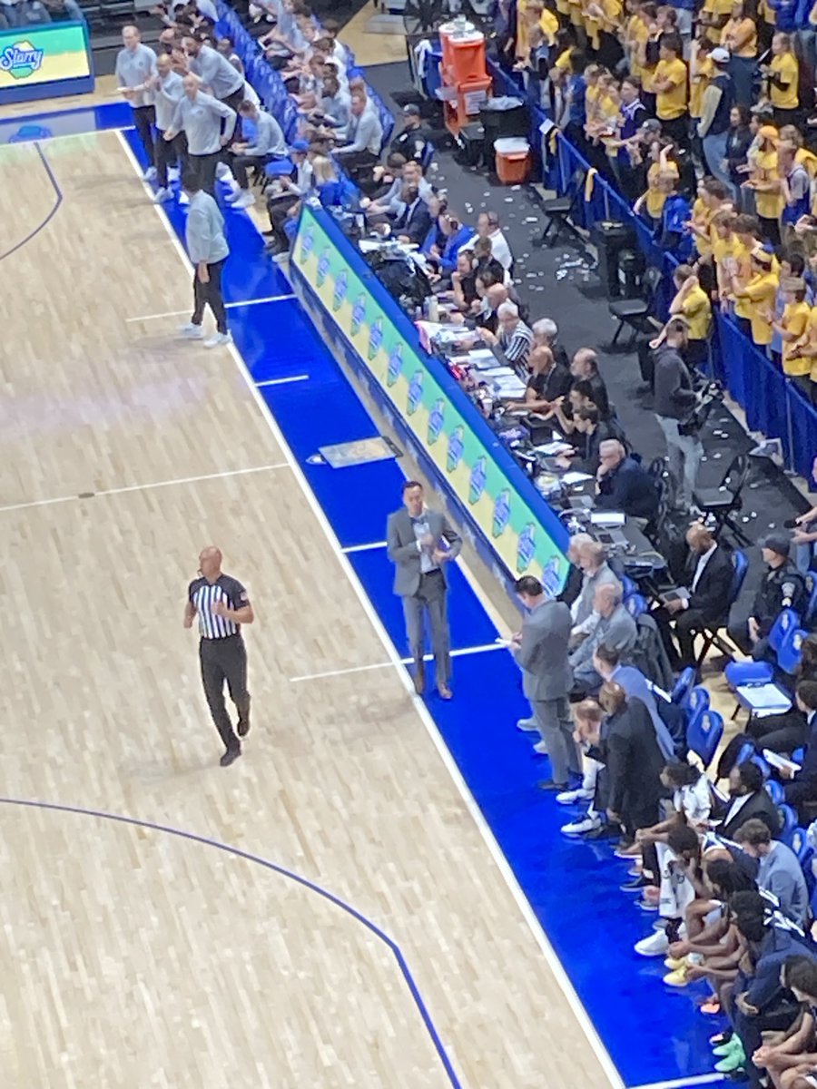 Channeling his inner Harold Reubens😬, the Longwood basketball coach Ronnie Thomas reaches to his suit pocket for the right script to answer the ⁦<a href="/Pitt_MBB/">Pitt Basketball</a>⁩ attack. #H2P  #PeeWeeHerman