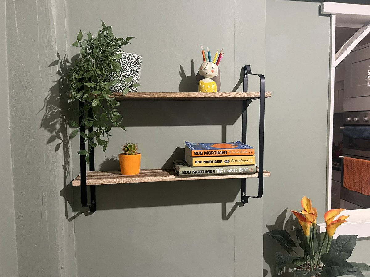 Raynch's tweet photo. @RealBobMortimer Dearest Bob! I think we can all agree that my simple new shelf display, works solely on your book cover colour selection. When choosing your next one, please don’t go rogue. Ta! Oh, and I have and always will.. love the smell of Kung Fu! https://t.co/gfCW5B3MKO