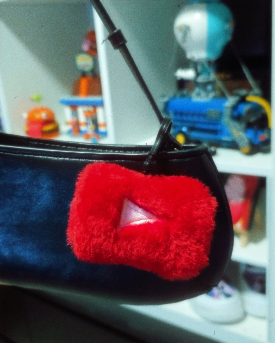 reddysh's tweet image. Got this fluffy Labubu at a YT event, who wants one? 🥰