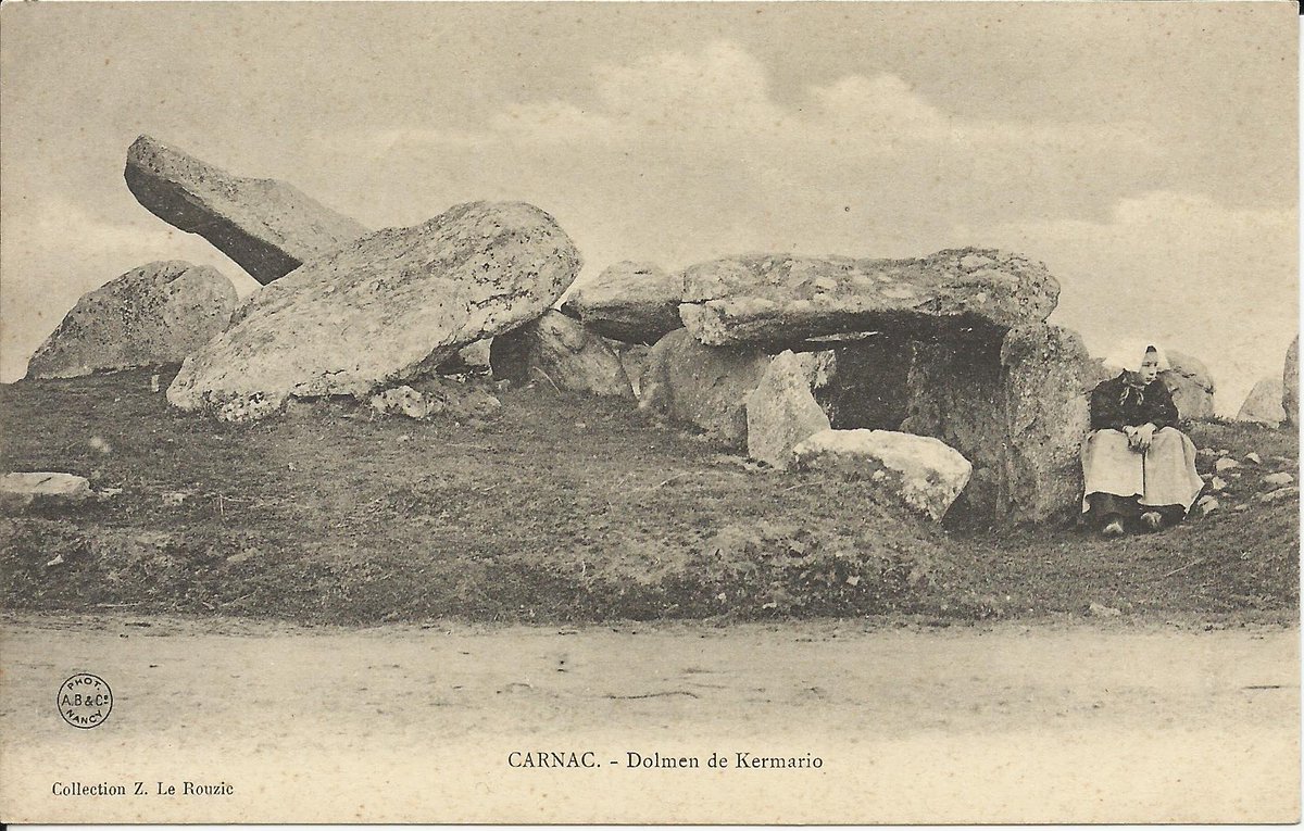 This view of the V-shaped passage grave on the SW corner of the alignments at Kermario in Carnac was taken from the bend in the road before the railings were erected by local archaeologist Le Rouzic. It was in print by 1903 and remained so for over 25 years.
