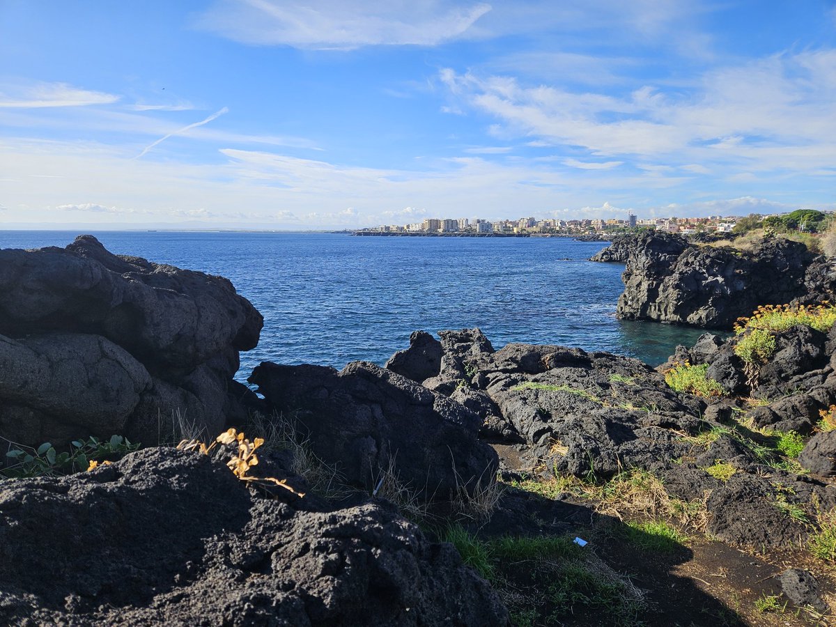 miserve's tweet photo. What if I just worked from here? …Well, the view, for starters. Got my laptop in my bag, but I think it’s staying there. Today’s about building some mental health. #catania #Sicily https://t.co/KFxLs0hoPK