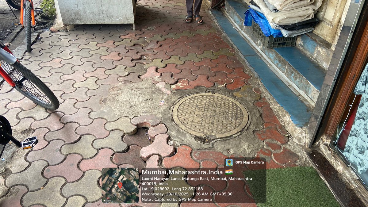 Kunalgoogly's tweet photo. Second reminder for the path holes on footpath . Had complained about this on 29:10:25 @mybmcWardFN @mybmc . It’s on foothpath of Ram Ashray hotel Matunga East . https://t.co/XitKNuv2Bt