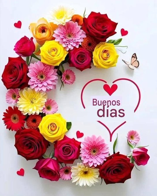 Multicolored roses in red yellow pink and orange cluster to form a large C shape on a plain white background. Pink and yellow daisies fill gaps within the arrangement. Red heart shapes dot the composition around the flowers. A small butterfly perches near the top. Bold red text reads Buenos dias centered in a large heart outline below the floral design.