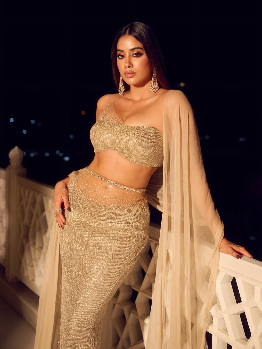 Janhvi Kapoor  entire midriff exposed — including her toned abdomen and navel (belly button)