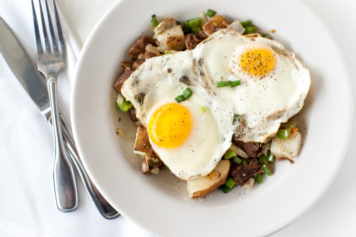 Wake up to comfort with our Pot Roast Hash. Two sunny-side eggs over Certified Angus Beef pot roast, crispy potatoes, cheddar, peppers, and green onions. Served with toast or a fruit cup.