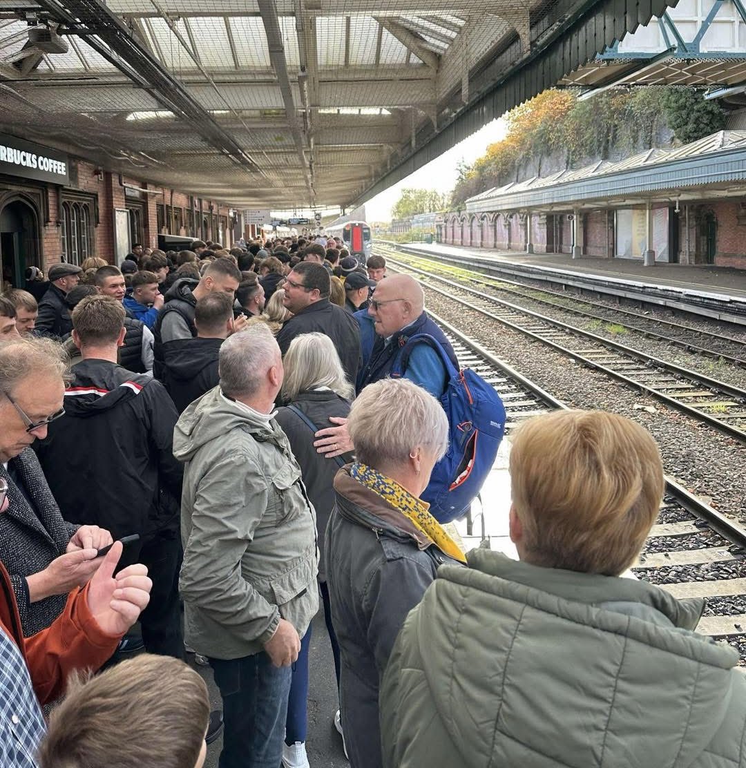 footyawayday's tweet image. Shrewsbury fans at the station heading to Crewe #salop