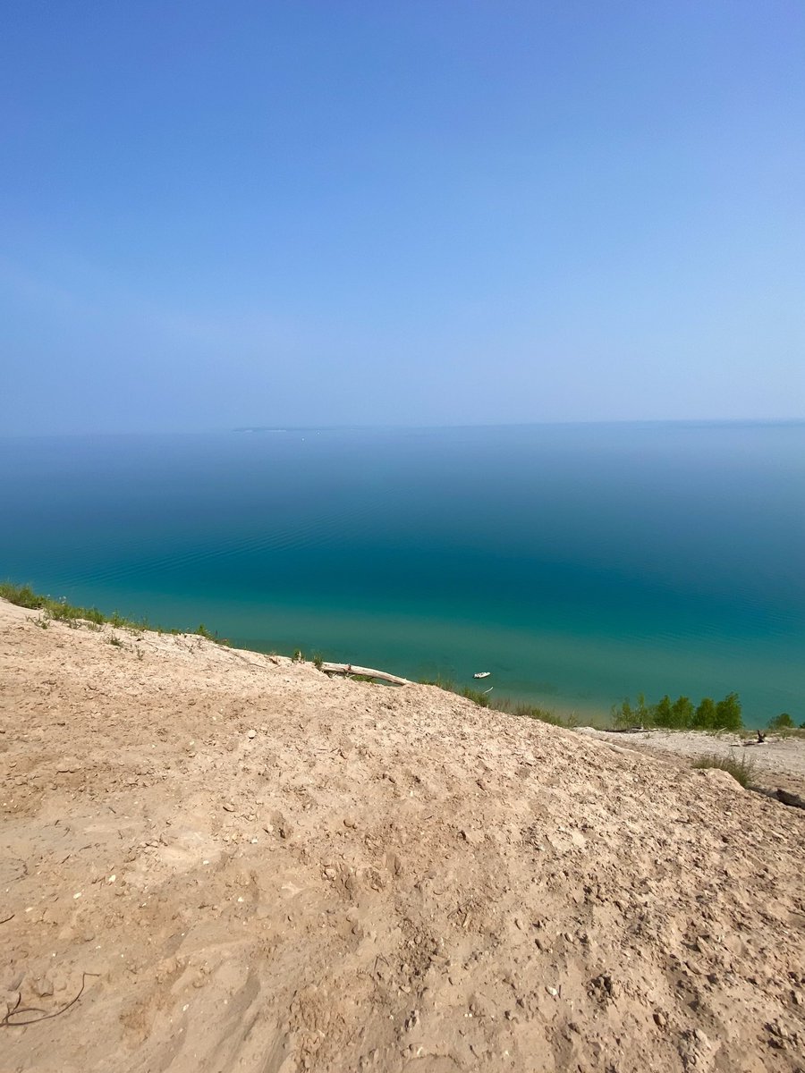 DoofyDue's tweet photo. A view above Lake Michigan this past summer. This shot is at the end of a 1-mile hiking trail called Pyramid Point. https://t.co/zovm9SkiW6