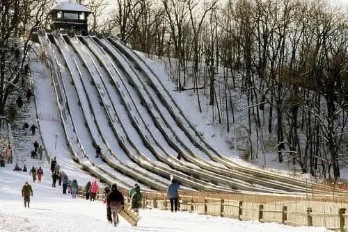 Who remembers the old Swallow Cliff Toboggan Slides in Palos Park?

The Swallow Cliff Toboggan Slides were one of Chicagoland’s most thrilling winter traditions, located in Palos Park and drawing visitors from across the region. The exact year of this photo may be uncertain, but