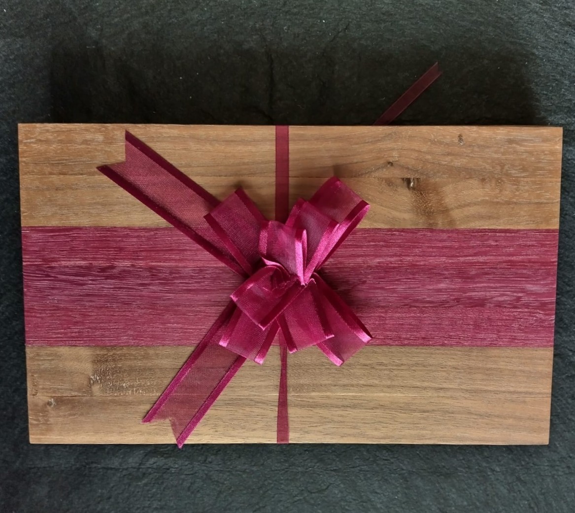 stevalwoodwork's tweet photo. These unique table mats have just been sold. Crafted from American walnut and purple heart, they are backed with natural cork to protect your table and give better grip. This popular design is much admired and was a set of six dressed with a beautiful bow to set them off. https://t.co/gw5Jqvn5V1