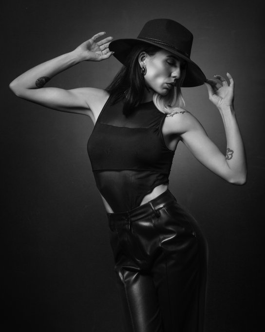 This portrait by Stuart Berman is a refined exploration of form, light, and expression. The mono....