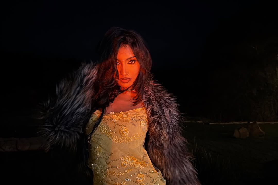 lareraj's tweet image. Clocked in for my favorite overtime: flirting with the fire, arguing with the moon, and winning both rounds.