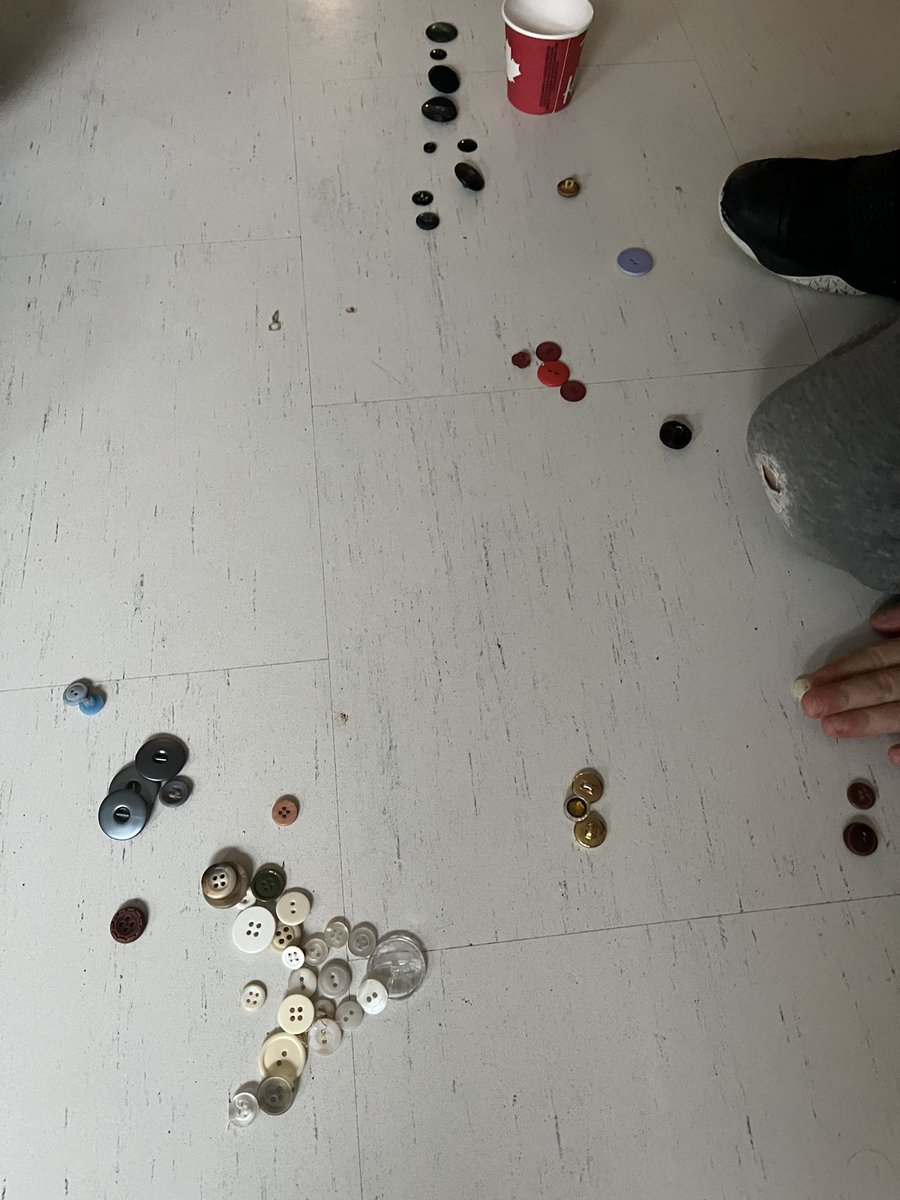 Sorting Mrs Totera’s button Box.  Thinking about what groups we outs make with our cup of buttons.  We sorted by colour, size and fanciness.
