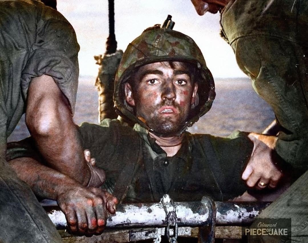 The iconic American wartime photograph "The Thousand Yard Stare" showing an exhausted 19-year-old US Marine Private Theodore J. Miller in February 1944 after two days of constant fighting at the Battle of Eniwetok. Mille
