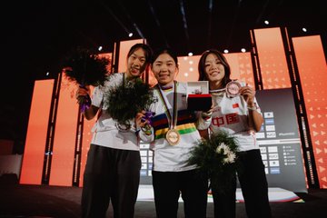 First image shows three male athletes on a podium in Riyadh with the second place athlete on the left wearing a blue jersey holding a silver medal and bouquet the first place in a white jersey with gold medal and rainbow jersey holding gold medal and bouquet third place in green jersey with bronze medal and bouquet standing on numbered platforms against a red and black backdrop with UCI 2025 Urban Cycling World Championships Riyadh Saudi Arabia logo sponsor panels like UCI and Tissot and hashtag Riyadh2025. Second image depicts three female athletes on podium second place on left in white top holding silver medal and bouquet first place in white top with gold medal and rainbow jersey holding bouquet third place in white top with bronze medal and bouquet on platforms with similar red black backdrop UCI branding and sponsor logos. Third image features three male athletes on podium left in blue USA jersey with bronze medal holding bouquet center in white with gold medal and rainbow jersey holding bouquet right in green with silver medal holding bouquet against orange backdrop with sponsor logos. Fourth image shows three female athletes on podium left in white with silver medal holding bouquet center in white with gold medal and rainbow jersey holding bouquet right in white with bronze medal holding bouquet backdrop with orange panels and sponsor branding.