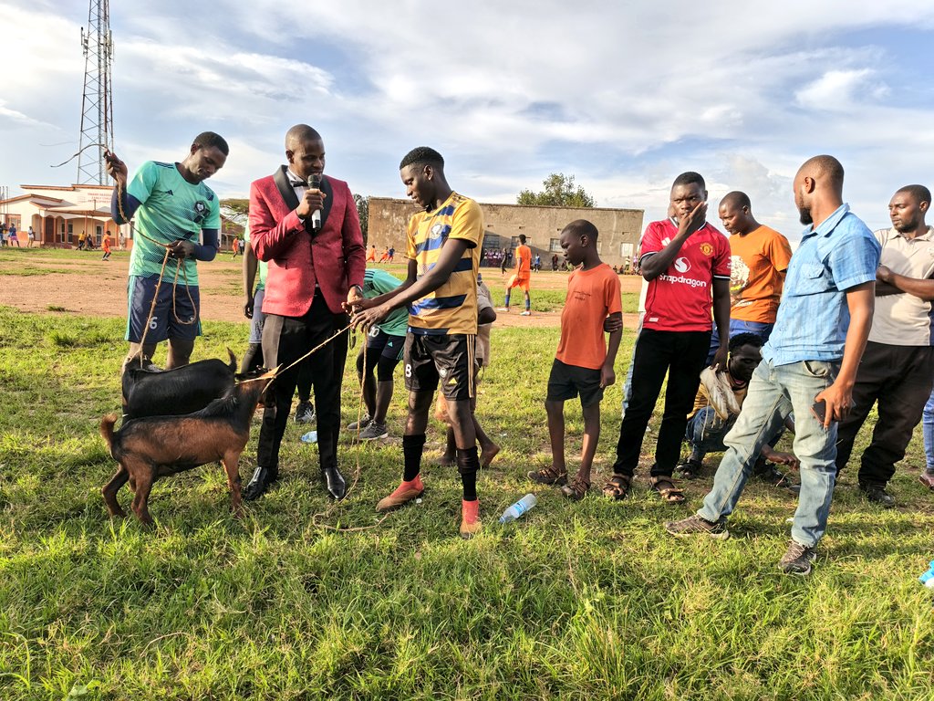 WVDUganda's tweet photo. The victorious Masaka Boda Boda Community was joyously presented with a goat by the guest of honor to celebrate their triumph in the #MasakaMenFootball match. 

What a wonderful gesture of love from the #Wetuli campaign. https://t.co/RhCqjkagA2