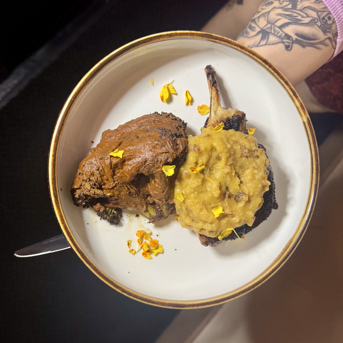 SuisGenerisNOLA's tweet image. Heritage berkshire pork chop, brined &amp;amp; char grilled with peruvian causa sauce &amp;amp; black mole baked broccoli - Nice! #porkchops #eaternola #nolafoodie