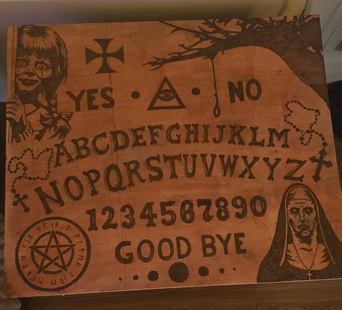 Ech0Link's tweet photo. The Conjuring series themed Ouija board i completed today. @SamandColby inspired me to get into the spooky side of woodburning. #TheConjuring #annabelle #samandcolby #art #pyrography https://t.co/U5U3Psk0yc