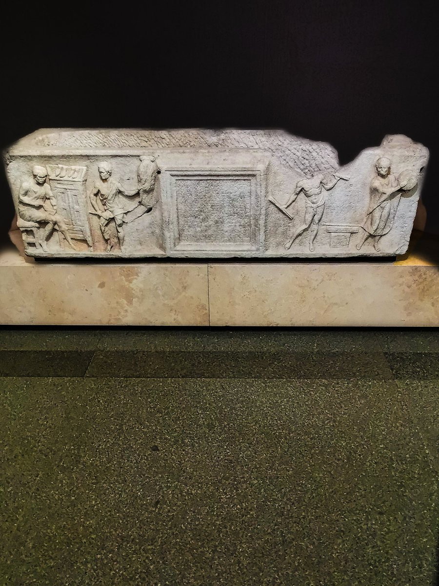 antmoose's tweet photo. #SarcophagusSaturday returns us to the #BathsofDiocletian in #Rome with this box from #OstiaAntica of the earlier C2 CE, made for a Greek shoemaker from #Ephesus. At left we see him at work, seated with a shoe in his hands, next to a ropemaker. At right, two musicians play. https://t.co/sUoFtMpWpj