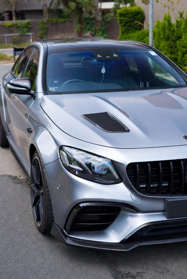 LoopUpdate's tweet photo. Mansory Mercedes-AMG E63 S “Grange” just rolled out looking like a silver bullet on steroids.
900 HP, carbon vents breathing fire, widebody ready to eat highways.
Daily driver or weekend apocalypse? 🪦💨
#Mansory #AMG #E63S #Mercedes #AMGE63 #MansoryMercedes #Widebody #900HP #GermanMuscle #SupercarKiller #CarPorn #LuxuryCars #ExoticCars #DreamCar #CarSpotting #SpeedHunters #CarGram #InstaCars #Petrolhead #V8 #BrabusVibes #StanceNation #CarLifestyle #AutoAddict