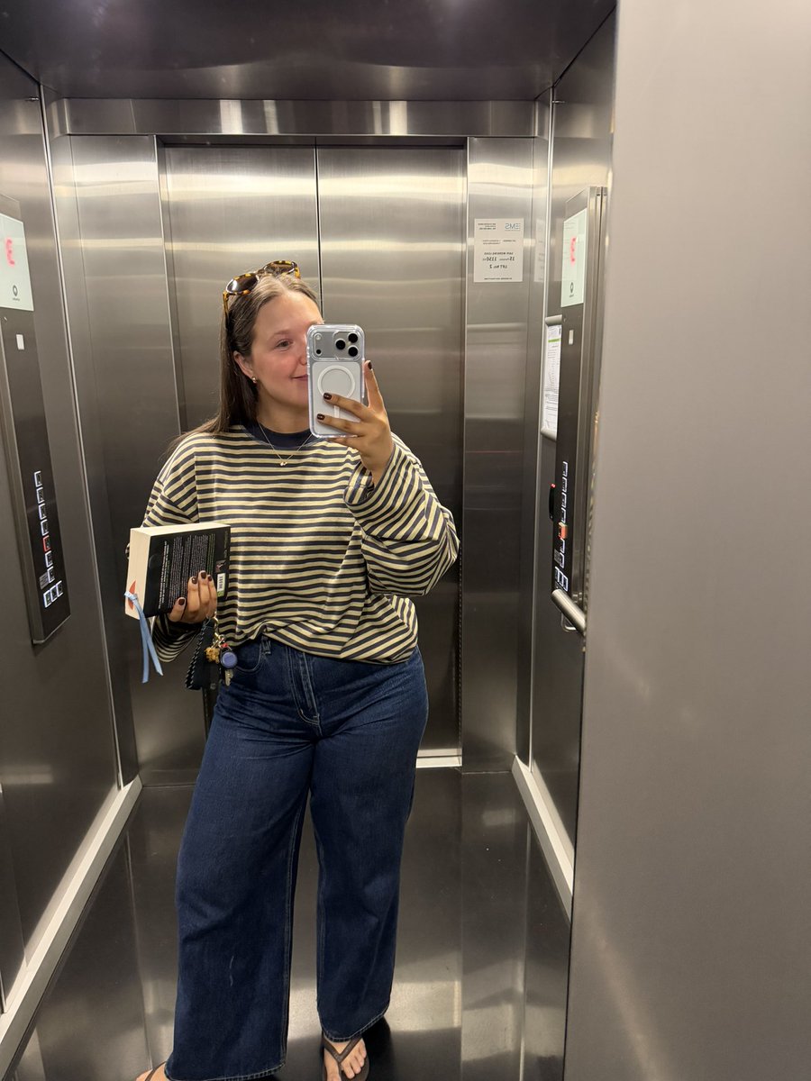 my fit today !! I’m also reading a non-fiction book called Crossing The Line 🫡