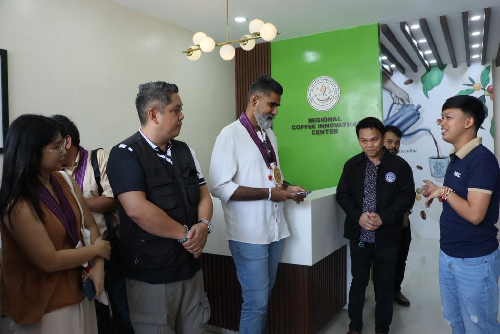 Nilushana's tweet photo. Honored to visit the Regional Coffee Innovation Center & Museum (RCIC) at Davao del Sur State College, a truly inspiring initiative bridging science, heritage, and innovation in Mindanao’s coffee industry.

My visit was part of the ongoing @IFAD DTI RAPID Growth Project Supervision and Implementation Support Mission, where we continue to strengthen linkages between projects and academia to ensure that research and innovation reach smallholder growers on the ground.

Often, academic research remains within the walls of institutions but through this strategic partnership, the project has gone the extra mile to translate technology into practice, empowering farmers to improve quality, enhance cupping scores, and capture better market value.

The RCIC stands as a symbol of what’s possible when development, academia, and local entrepreneurship work together for a more inclusive and sustainable coffee value chain. 

#IFAD #RAPIDGrowth #CoffeeInnovation #ValueChainDevelopment #Mindanao #DavaoDelSur #SustainableAgriculture #SmallholderEmpowerment #InclusiveGrowth
