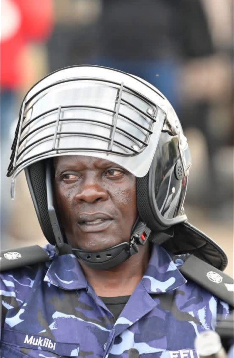 Humanrights256's tweet photo. This is the clear of Afande Moses Mukiibi attached to Field Force Unit (FFU)

Mukiibi is the commander of the police officers who follows presidential candidate Kyagulanyi everywhere he goes for campaigns 

The same mukiibi commanded his officers to attack Kyagulanyi at a hotel in Lira district northern Uganda leaving the hotel vandalized without compensation.

The same mukiibi has arrested alot of Kyagulanyi supporters and brutalized many of them.

We are monitoring his acts and soon we will release his personal information including his family for the world to know.