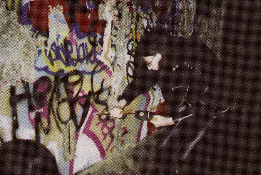 On this day in 1989 the Berlin Wall dividing East Germany from West Germany crumbled.

Photo: Joey Ramone lending a hand.