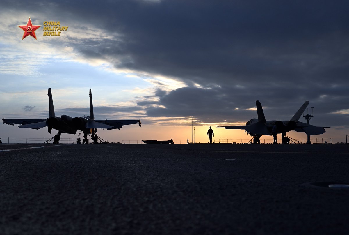 Photos show aircraft carrier Fujian (Hull 18) attached to the navy of the Chinese PLA Southern Theater Command being moored silently at a wharf. China's first aircraft carrier equipped with electromagnetic catapults, the Fujian, was officially commissioned into the Chinese PLA