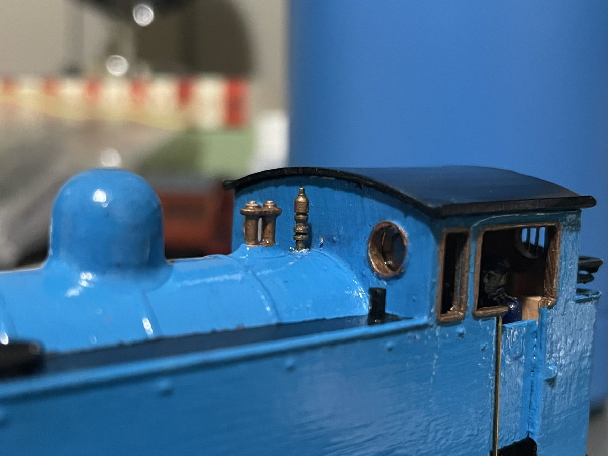 really doing everything but his waterslide transfers 

i’ve added his whistle, brakepipes, piping underneath the running board, and handrails  

next time i show him he’ll be done i swear