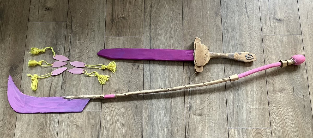 Going to my niece’s birthday party soon. She’s a big Kpop Demon Hunters fan (of course!) so my 11yo MADE a full set of demon hunters weapons for her, essentially from cardboard, wool, and hot glue 🤯💜🤩