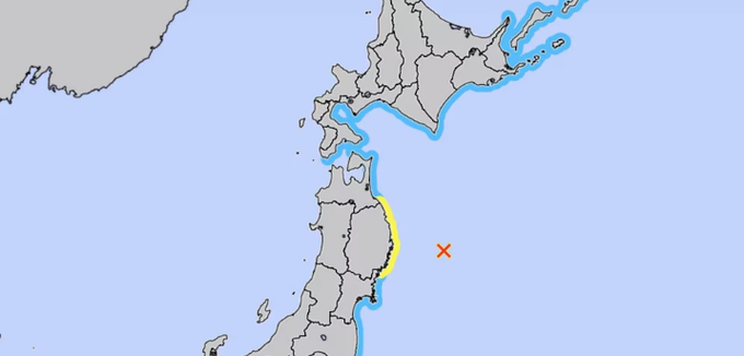 Map of Japan with gray land areas outlined in black, blue ocean surrounding the islands, a yellow X mark on the eastern coast near Iwate prefecture indicating the earthquake epicenter, and a blue highlight along the coastline.