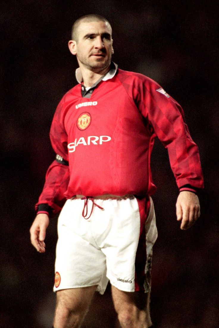 He walked the pitch like it was his throne,
Every touch, every glare like power of his own.
The collar up, stance of command,
Fearless in spirit, defiant and grand.
An aura that silenced, a presence so rare,
You felt his greatness just being there.
Eric Cantona- King beyond rules