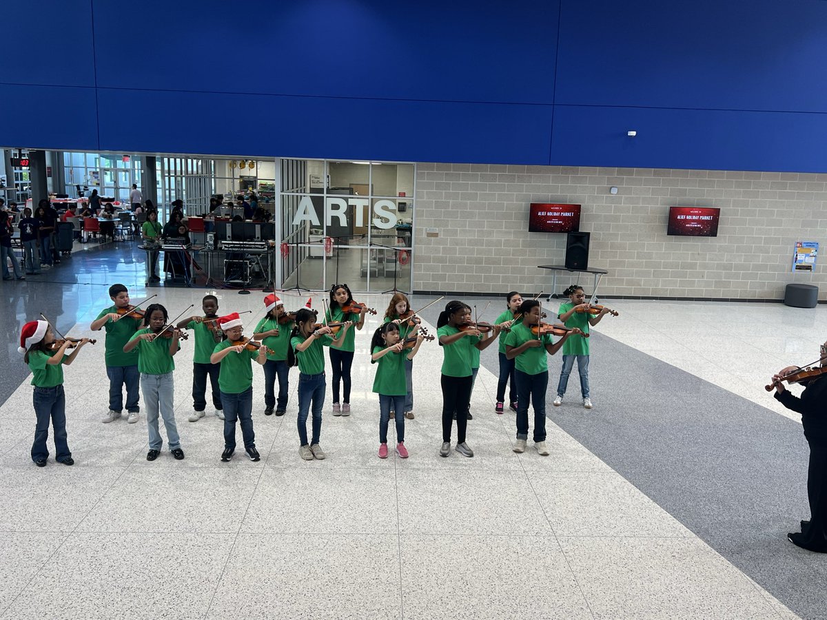 Chancellor Strings performed at Alief Holiday Market!