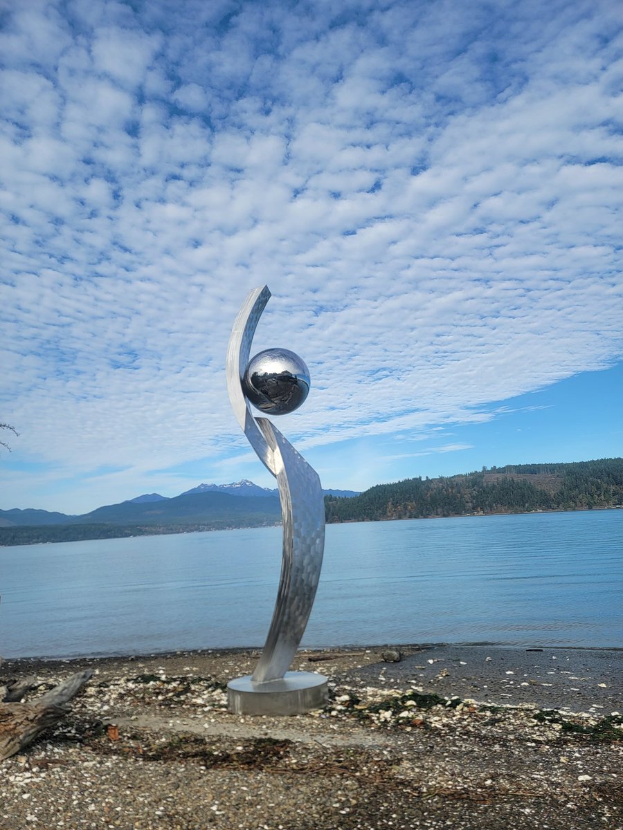 "FLOW"

In a rare break in the normal drizzle &amp; gloom of a PNW autumn, I ran out yesterday with my newest sculpture to get a few pictures.

Flow
Stainless steel 
Available 
$63,000

(There is also a 6-ft version of this sculpture with pictures coming in the near future)