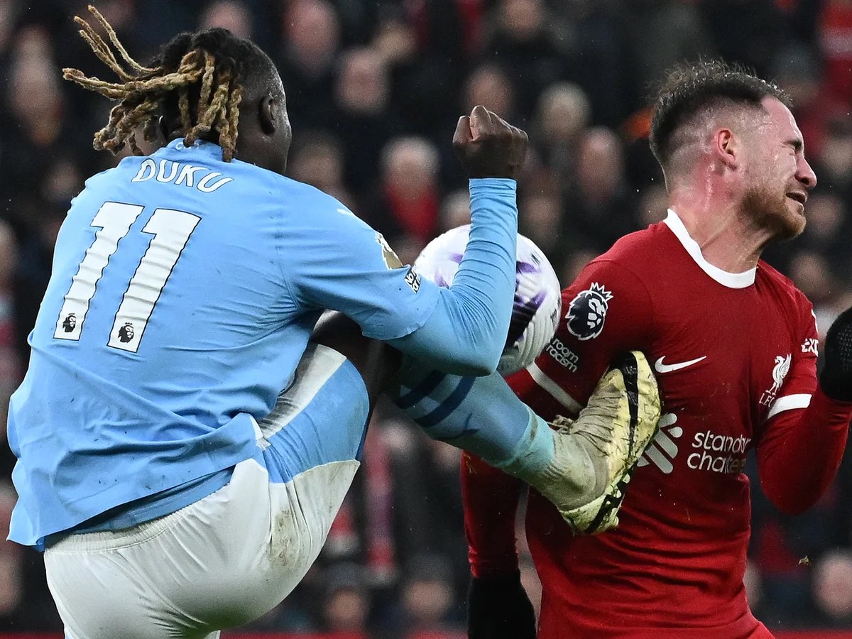 leer1919's tweet photo. @MenInBlazers Blatant cheating by Michael Oliver. The FA cannot continue to allow it. Was not a Penalty on Doku and Robertson was not in the Keeper’s line of sight. He also didn’t deem this a Red in the past. https://t.co/TZp6E6x1RP