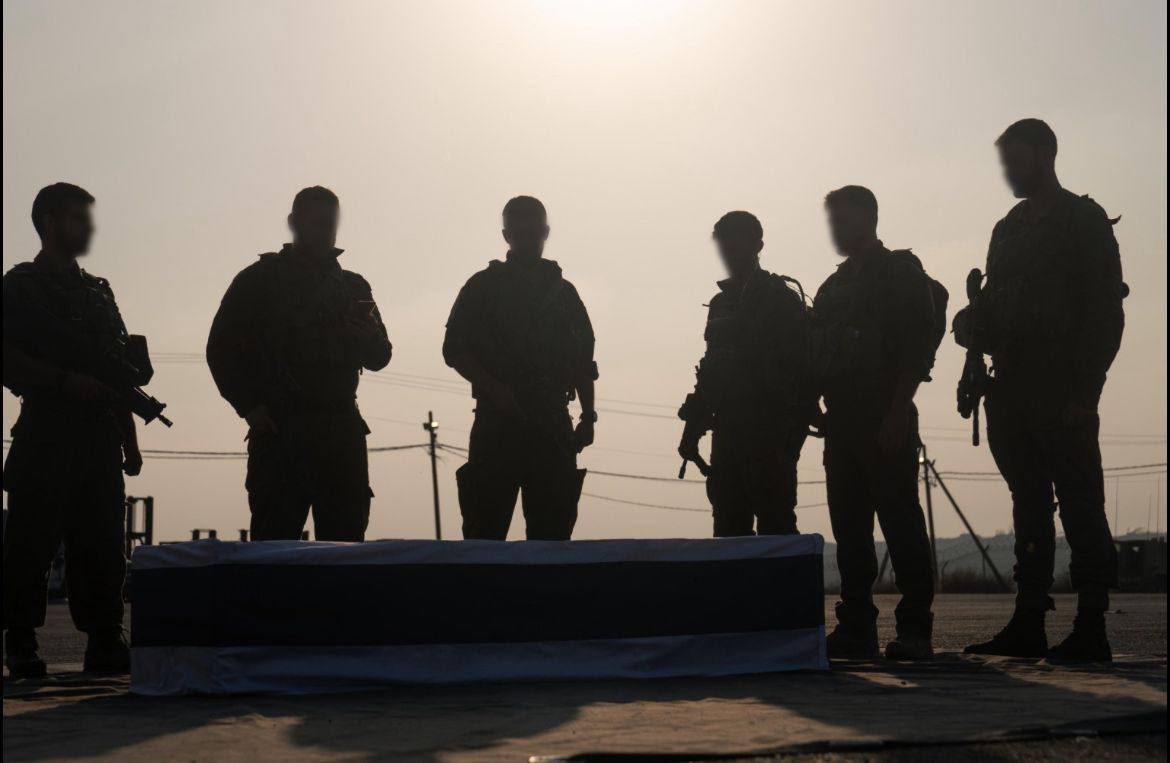 Hadar Goldin’s team, who fought with him in Operation Protective Edge in 2014, happens to currently be on reserve duty for receiving dead hostages’ coffins (among other tasks), and they were given the coffin of Hadar — the teammate they have been waiting for for 11 years.  

An
