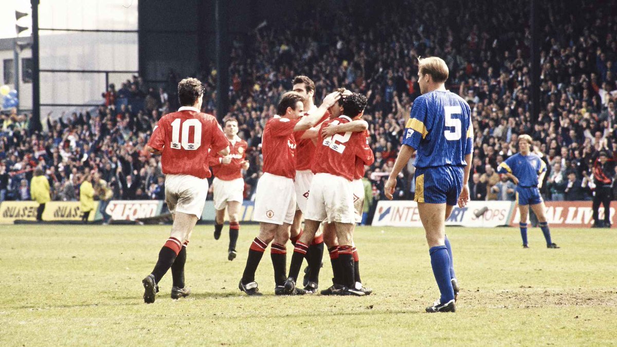 Selhurst Park, May 1993.. a great picture.. United's travelling support celebrate all over the ground.. Bryan Robson has scored the last goal of our season.. we win 1-2 at Wimbledon.. Manchester United champions of England at last.. a carefree summer forthcoming.. <a href="/Fergie_Years/">🇾🇪The Fergie Years🇾🇪</a>.