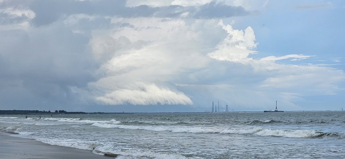 Current view of the Cape from the beach. 1308 EST