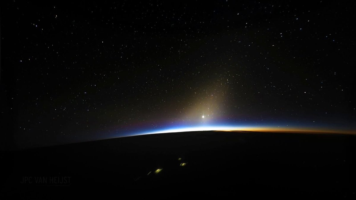JPCvanHeijst's tweet photo. First Light.

It started with a faint glow: the Zodiacal Light: sunlight reflected off a trillion tiny dust particles in the solar system, likely originating from the dusty sandstorms of Mars that left it's atmosphere in the timespan of many millions of years.

To complement the vision of our celestial neighbourhood, planet Venus shines brightly ahead, reflecting solar rays from her cloudy atmosphere, over a thirty millions of miles away.

Far beyond our own planetary system, literally of stars glow in a wide variety of colours and intensities, as the first signs of a new dawn slowly appear on the eastern horizon.
And with clear skies and enough contrast ahead, one can even make out the distinct curvature of the horizon at 37,000 feet, visible as long as the windows offer a wide enough perspective.

Even though my Boeing 747 travels around one-third of the planet tonight, it’s next to nothing compared to the distances across space and time that unfold beyond my cockpit.
No navigation screen or weather radar onboard reaches far enough to show me what’s really out there, except my own imagination and sense of wonder.

Who knows what lies beyond.
The stars are waiting.
Per aspera ad astra.