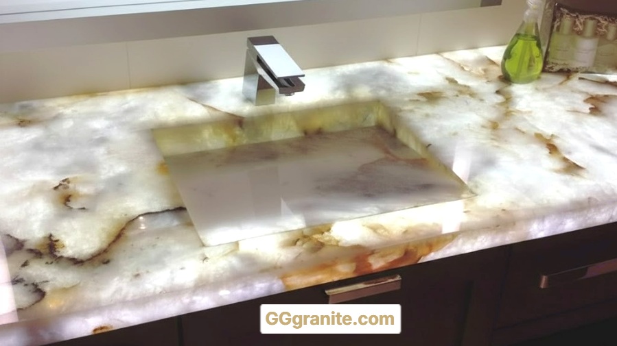 BACK-LIT QUARTZITE INTEGRATED CUSTOM VANITY COUNTERTOPS GGgranite.com #GGGranite #LuxuryCountertops #StoneExperts #QuartzSpecialists #HighEndInteriors #CustomStoneDesign #HomeRenovationExperts #InteriorDesign #LuxuryLiving #SoCalHomes