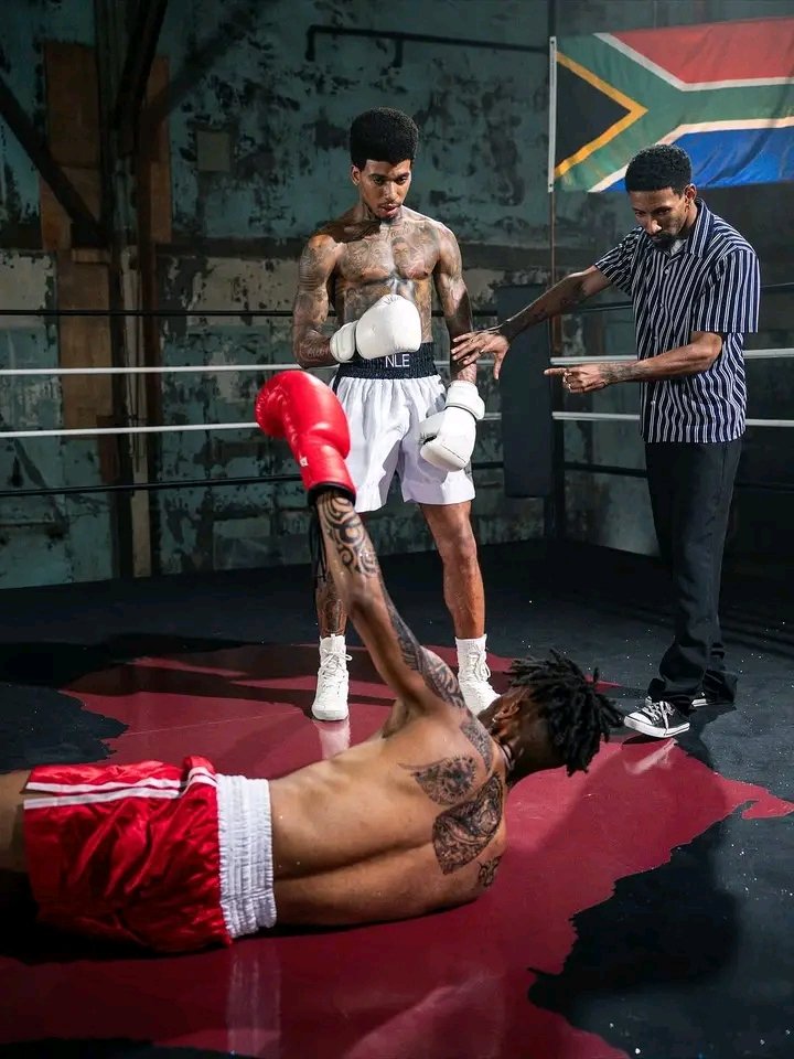 rapkulture_za's tweet image. 🇺🇲NLE Choppa had a South African flag in his ‘KO’ music video